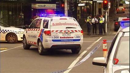 Woman struck by garbage truck in CBD