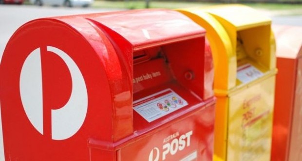 Australia Post to split in two divisions by axing 900 jobs