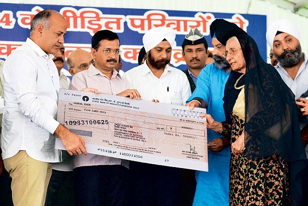 kejriwal grants sikh compensation