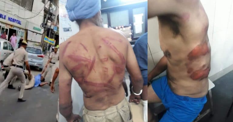 delhi police attack sikh father son